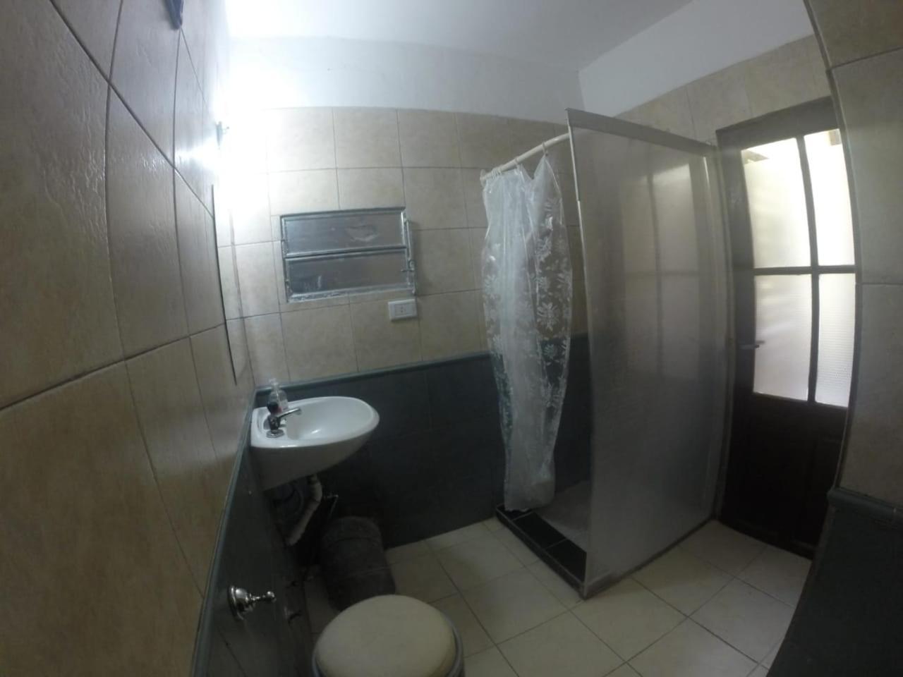 Kymani House Hotel Rosario Bagian luar foto